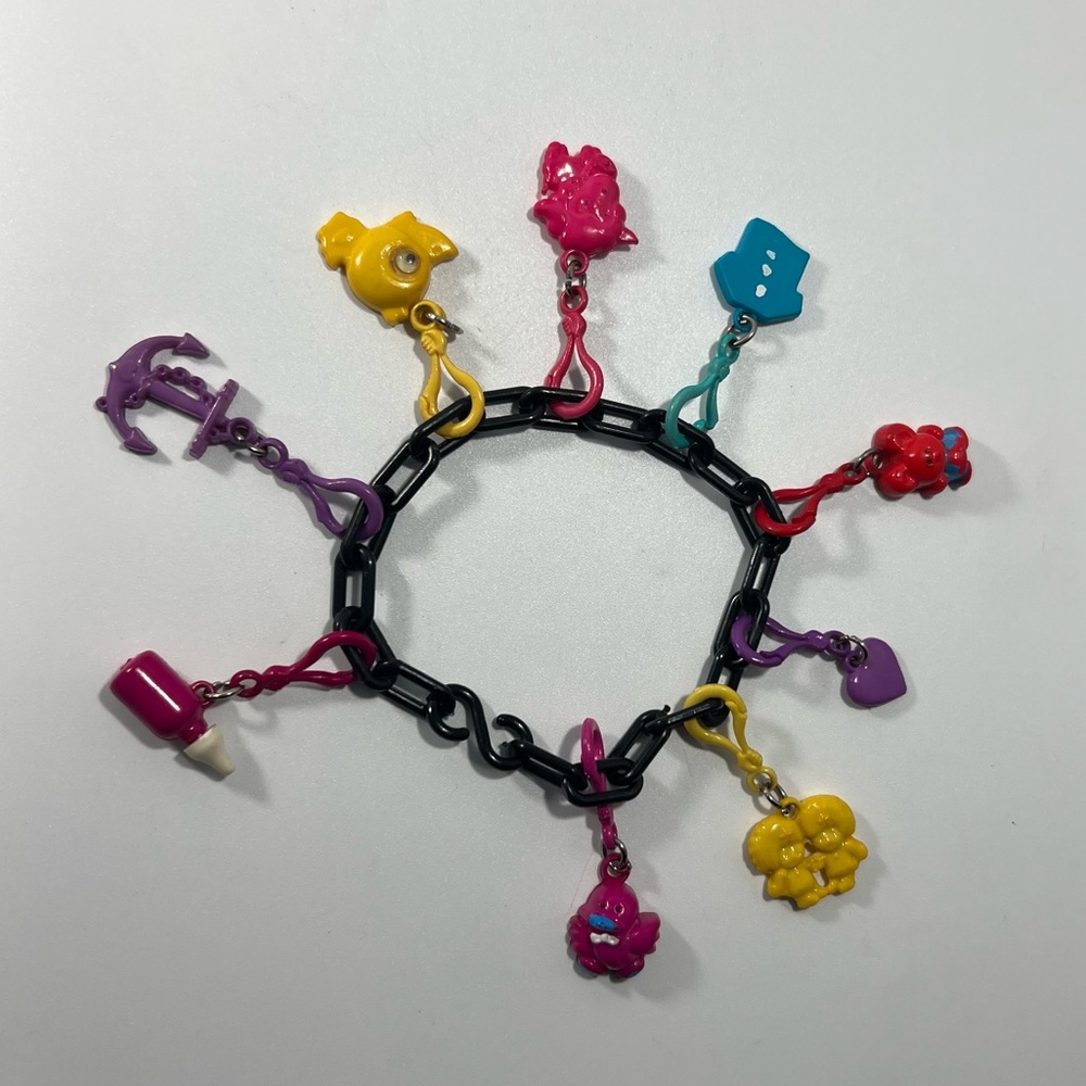 Miniature Clip Charm Bracelet Plastic Bell Charms on Plastic Chain